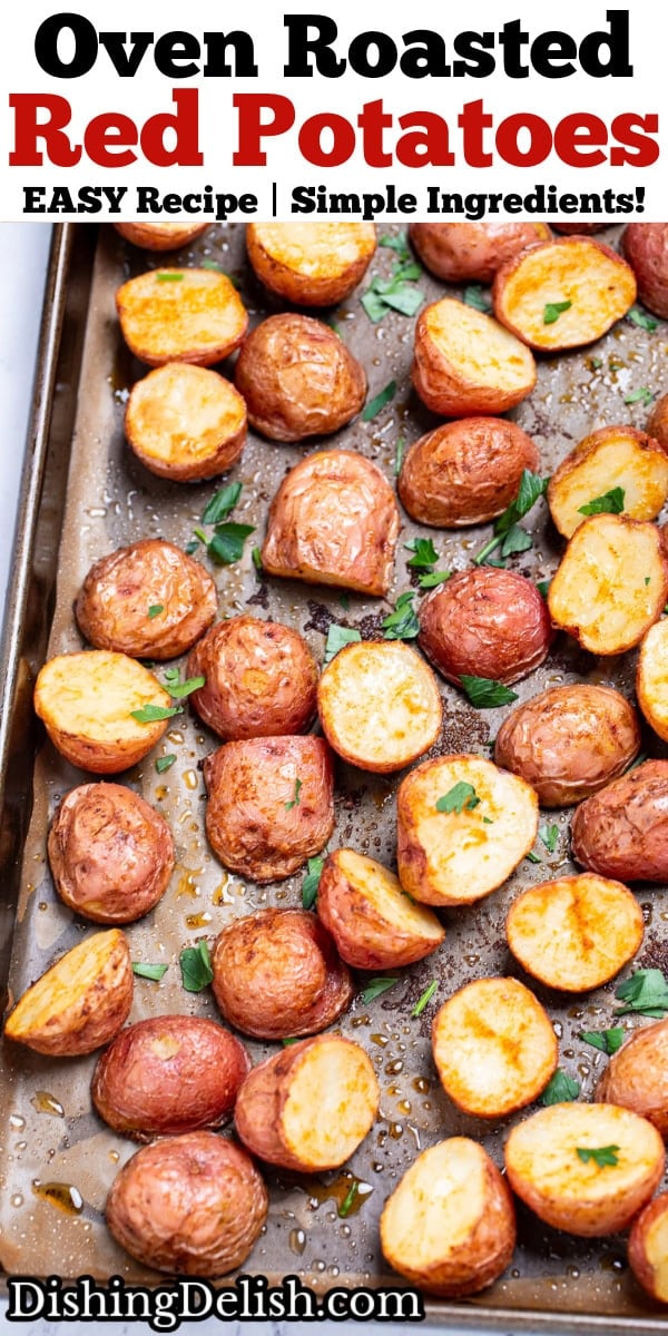 Pinterest pin with a sheet pan lined with parchment paper, with seasoned halved red potatoes after being roasted, topped with chopped fresh parsley.
