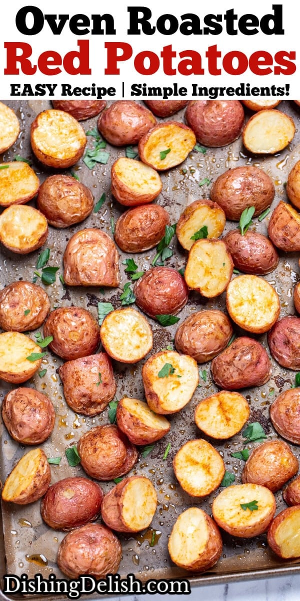 Pinterest pin with a sheet pan lined with parchment paper, with seasoned halved red potatoes after being roasted, topped with chopped fresh parsley.