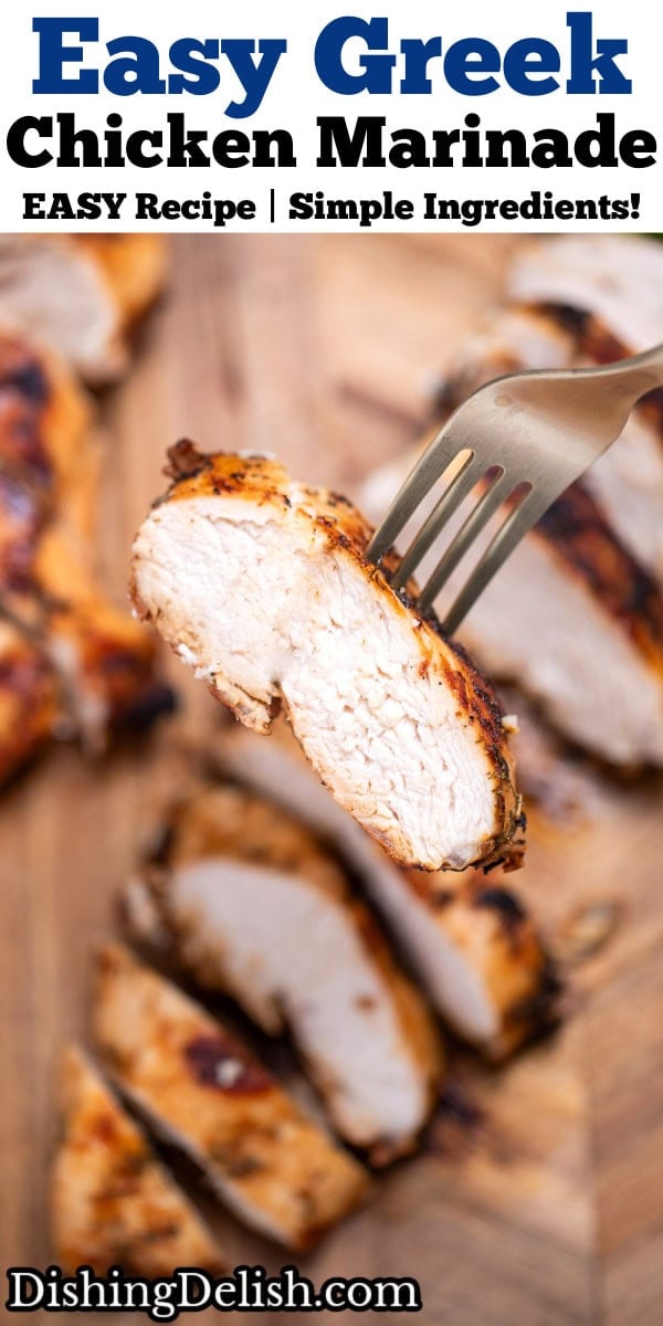 Pinterest pin with a cutting board with Greek marinated chicken sliced next to fresh parsley, and a fork lifting a piece up.