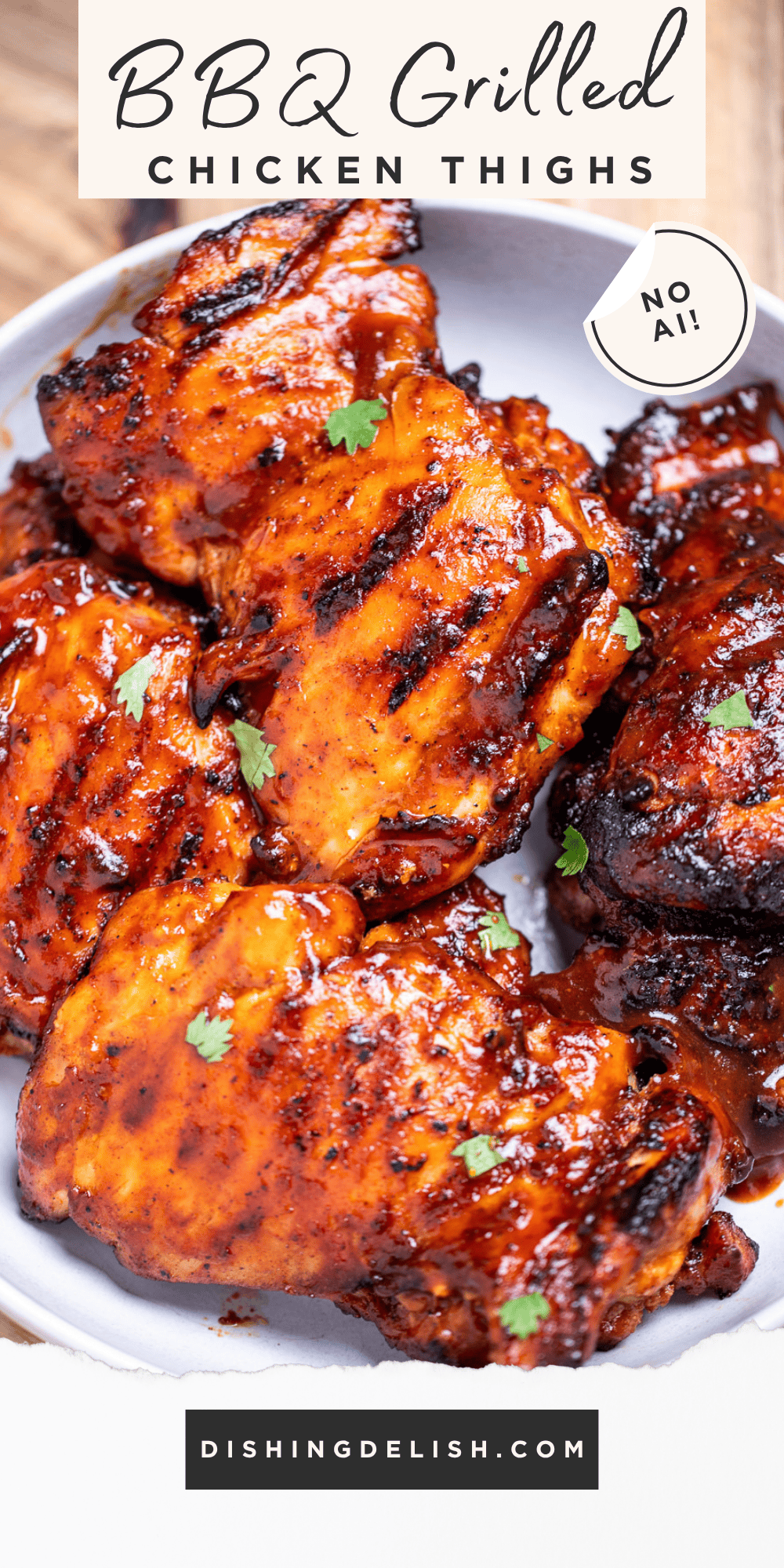 Pinterest pin with a bowl of BBQ chicken thighs, sitting on a cutting board.