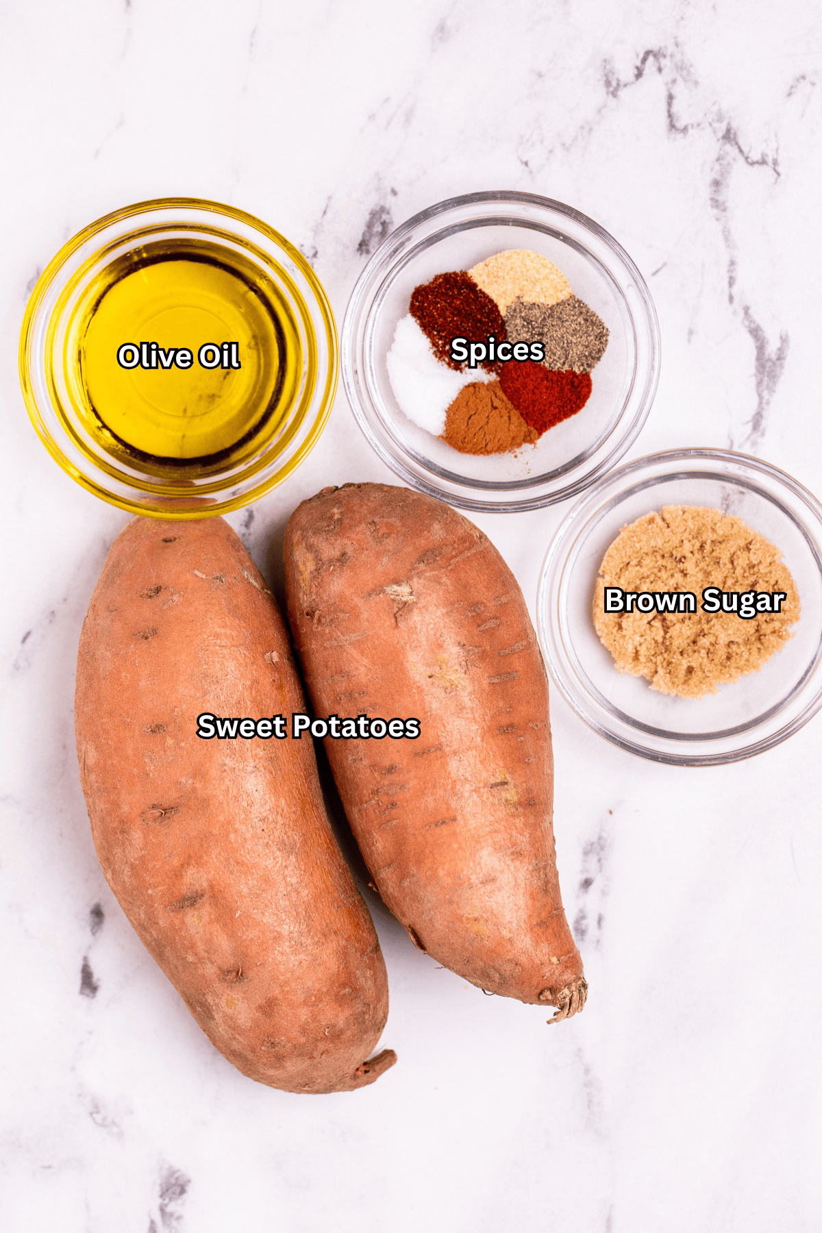 Individual ingredients for grilled sweet potatoes on a table.