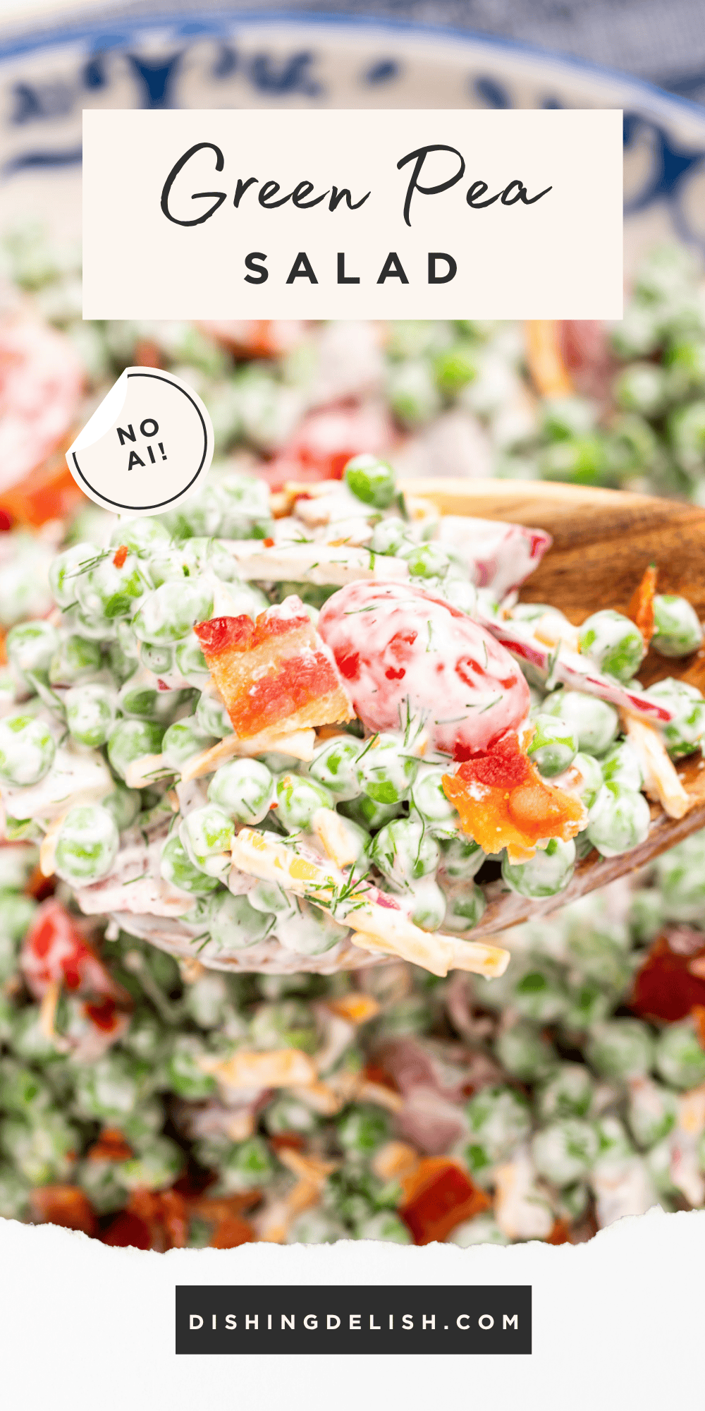 Pinterest pin with a serving bowl on a tea towel next to a wooden spoon, full of green pea salad topped with crispy bacon, with a spoon lifting some up.