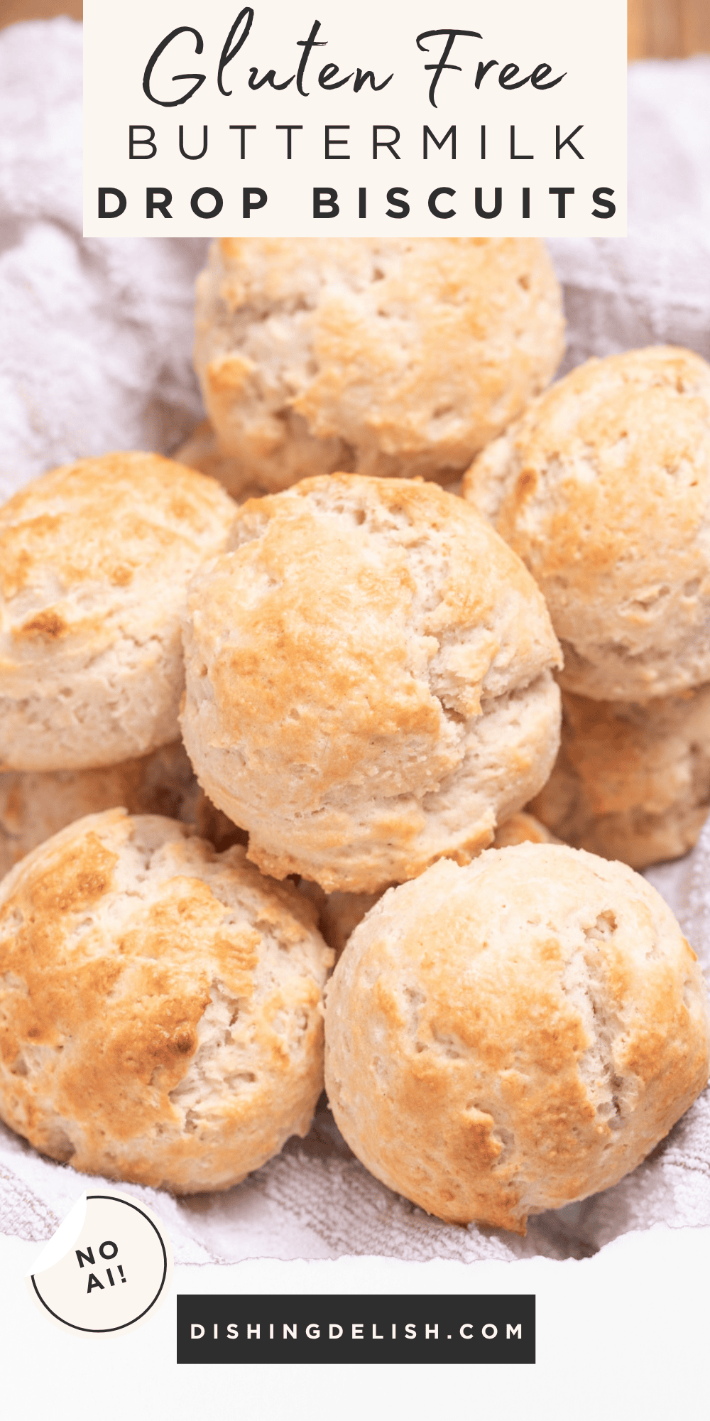 Pinterest pin with a basket with a tea towel full of gluten free drop biscuits resting on top of each other.