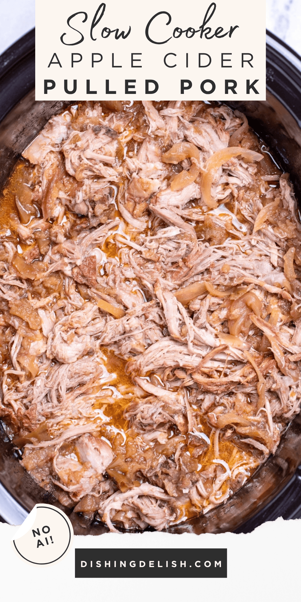 Pinterest pin with a slow cooker full of shredded apple cider pulled pork.